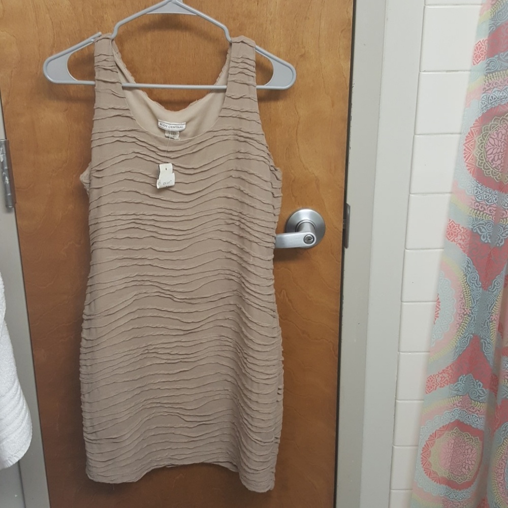 Beige ruffled dress
